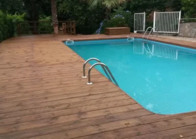 Uso de pino tratado y madera tropical en piscina - MARLO Multiservicios
